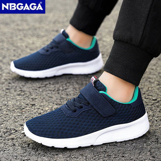 Navy blue running shoes with white soles worn by a person on a concrete surface, with 'NBGAGA' branding.