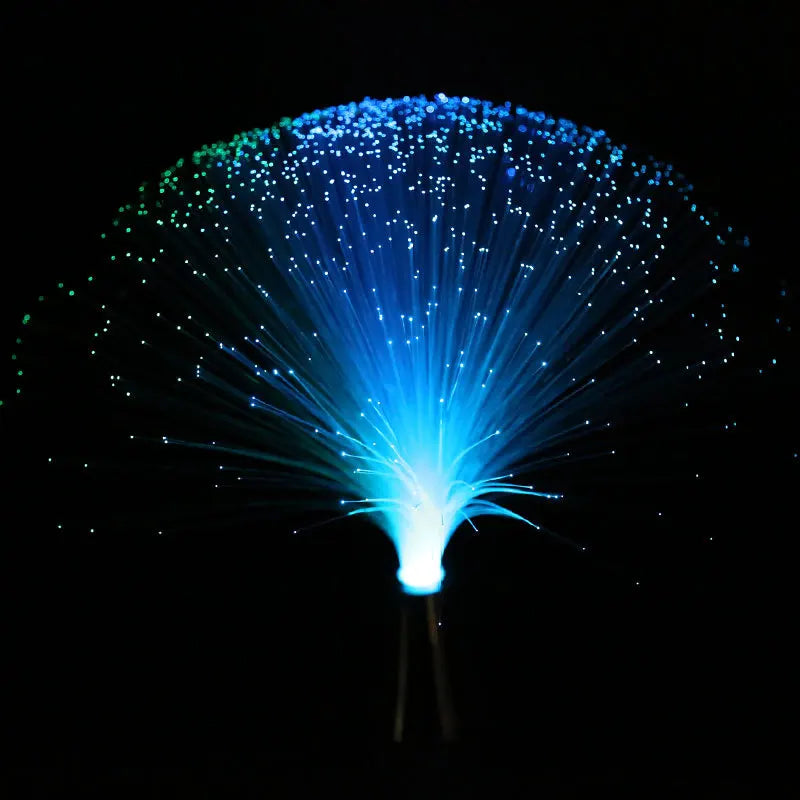 Close-up of fiber optic strands illuminated in starry pattern