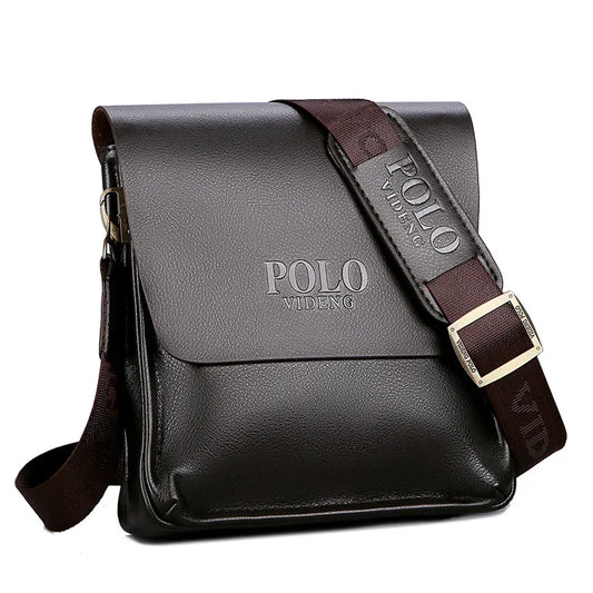 Black leather shoulder bag with brown strap and visible 'POLO' branding on a white background