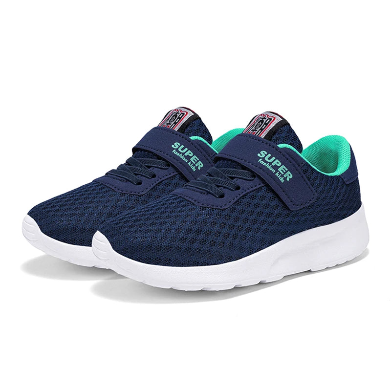 Navy blue children's sneakers with white soles on a white background